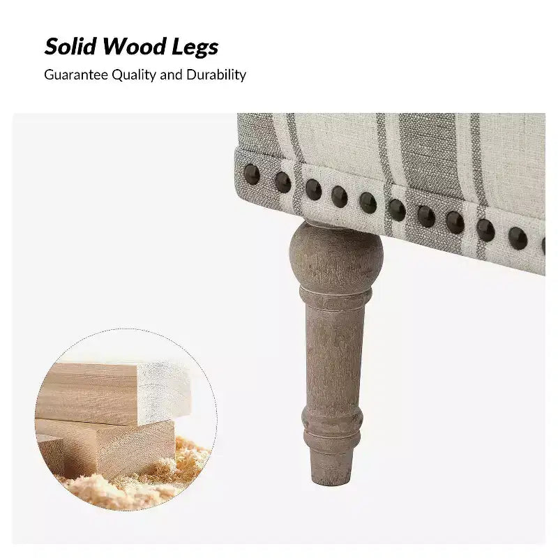 Fauteuil rembourré en bois avec clous décoratifs et motif à rayures